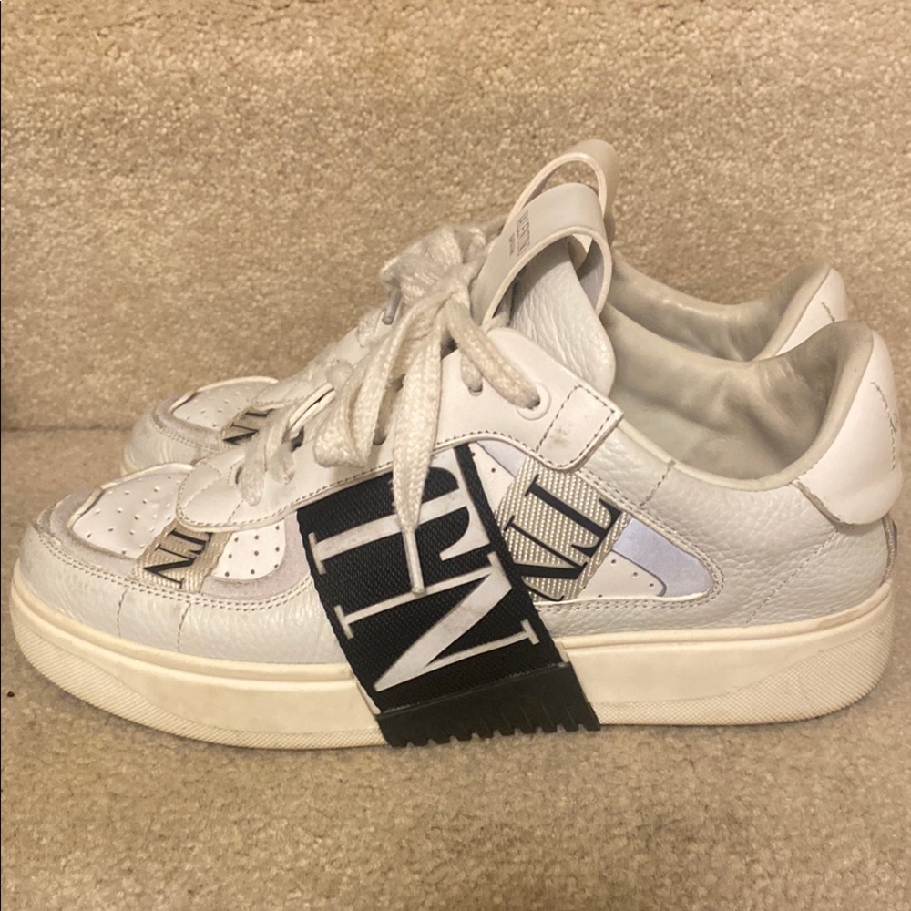 White Sneakers with Black Logo Accent